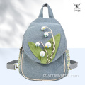 Mochila artesanal de algodão floral com estética florestal para mulheres